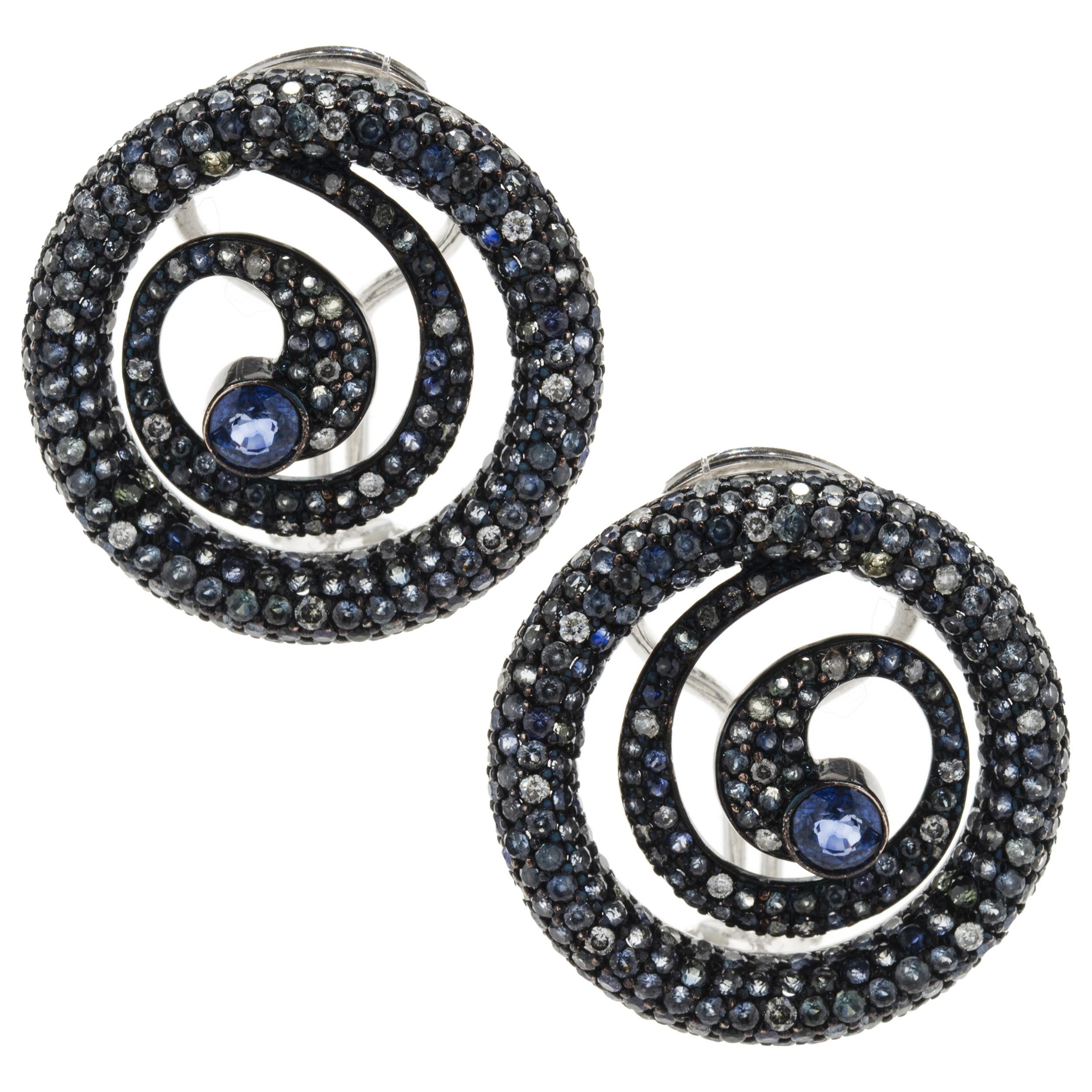 18 Karat White Gold Sapphire and Diamond Swirl Earrings For Sale