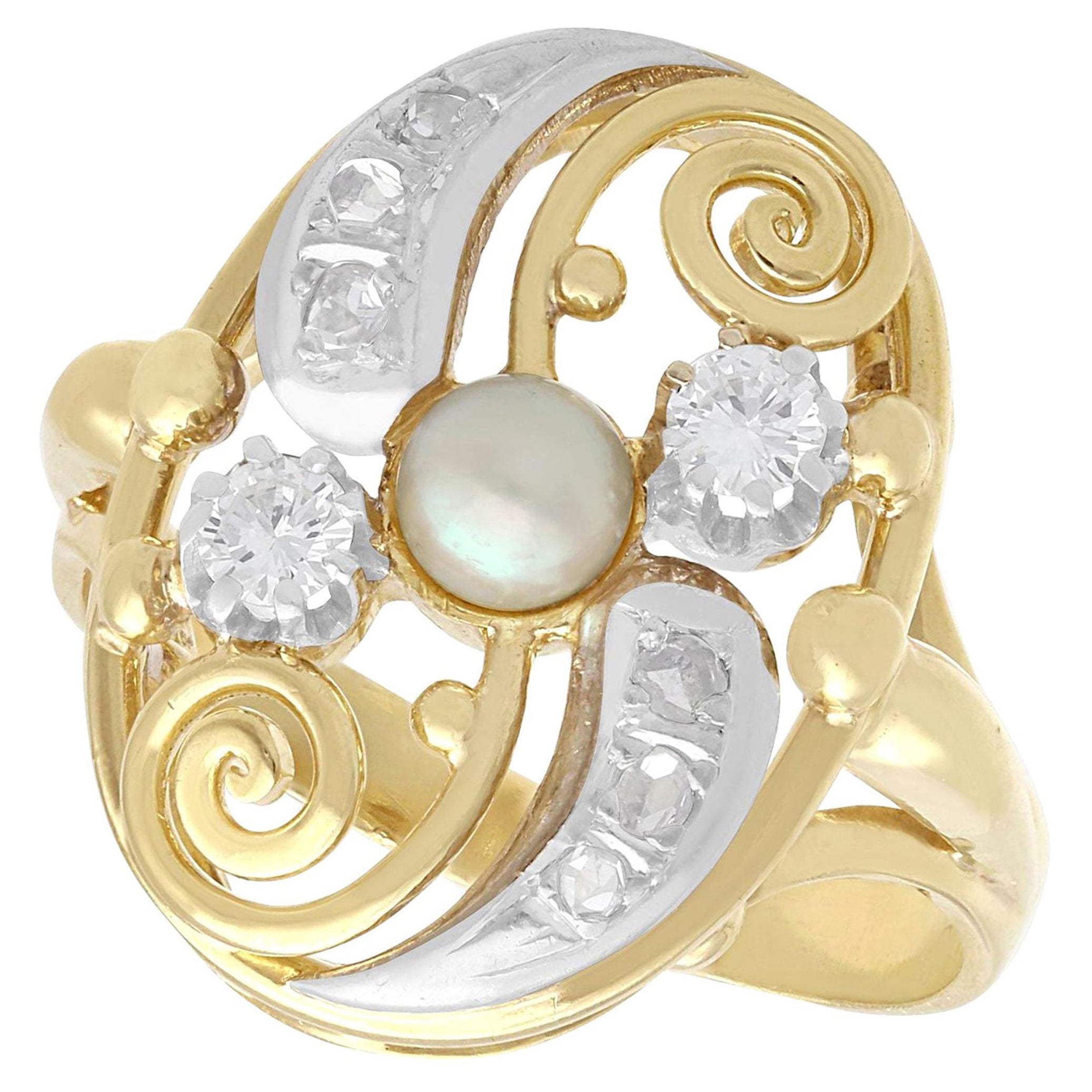 Anillo de cóctel de oro amarillo con diamantes y perlas de los años 40