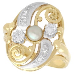 Anillo de cóctel de oro amarillo con diamantes y perlas de los años 40
