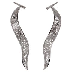 Boucles d'oreilles «glie » en or blanc et diamants 1,54 carats