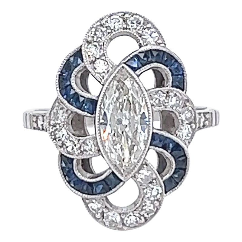 Art Deco Inspired 0.72 Carat Marquise Cut Diamond Sapphire Platinum Ring For Sale