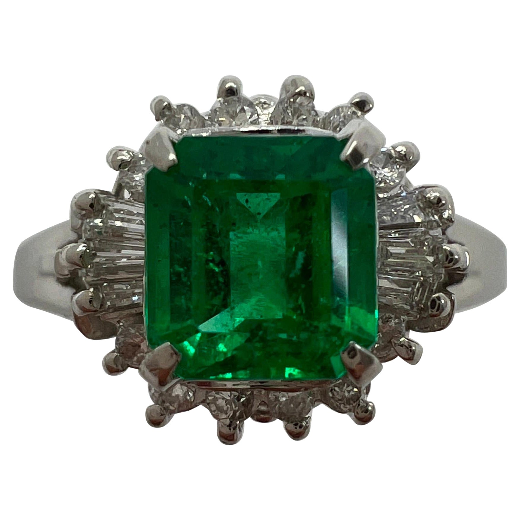 Colombian Emerald and Diamond Halo Ring For Sale at 1stDibs