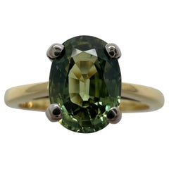 Bague solitaire en or 18 carats avec saphir vert vif naturel de 1,75 carat de taille ovale