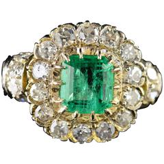  1.68 Carat Emerald 1.32 Carats Mine Cut Diamonds Gold Ring