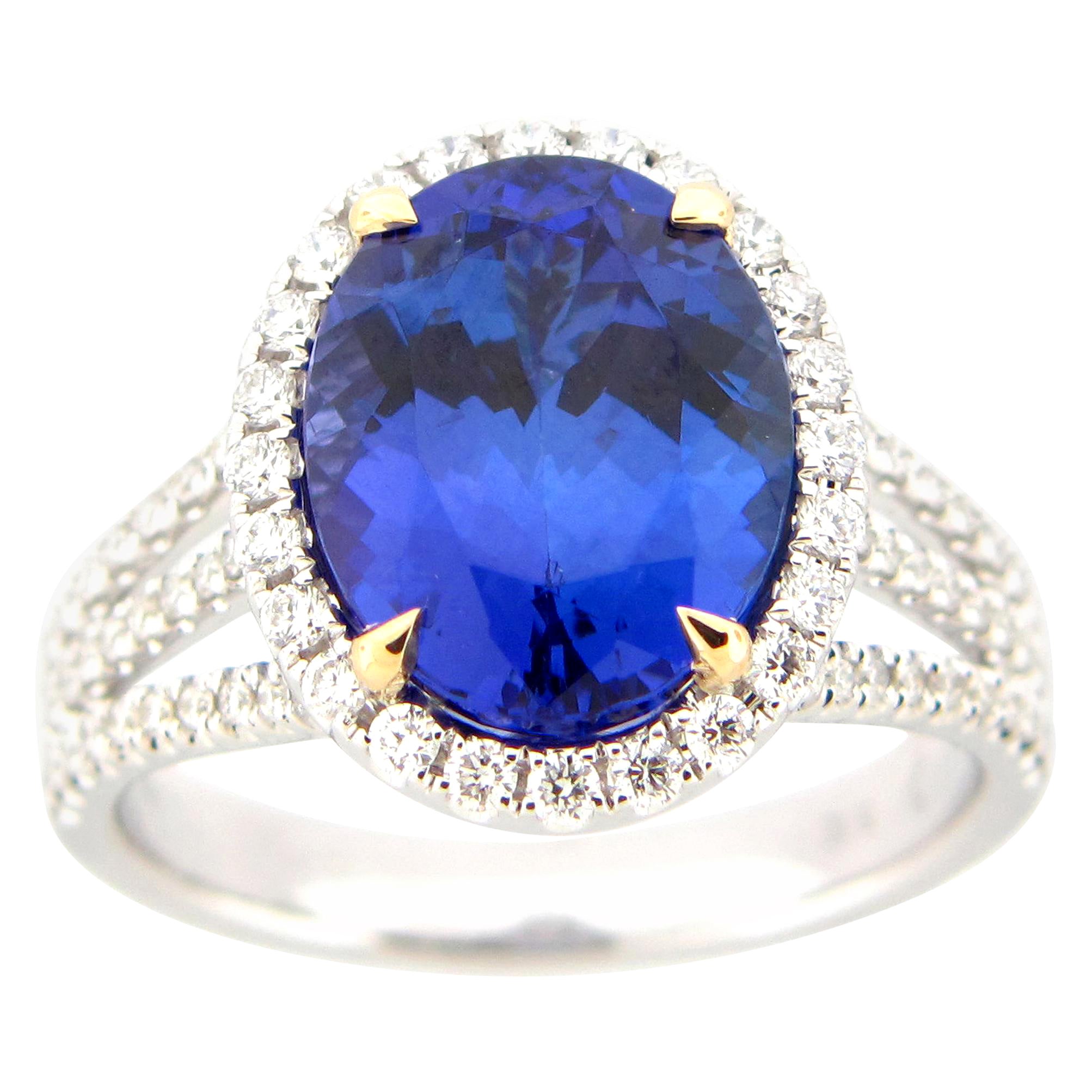 2.45 Carat Oval Cut Tanzanite and Diamond Halo Flower Ring in 18K White Gold  For Sale at 1stDibs | costco tanzanite ring, costco flower ring, tanzanite  costco