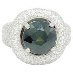 GIA Zafiro azul verdoso sin calentar y anillo de cóctel de diamantes blancos en platino