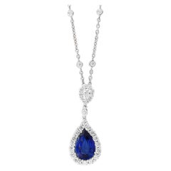 5.10 Carat Pear Shape Blue Saphire and Diamond Halo Drop Pendant Necklace
