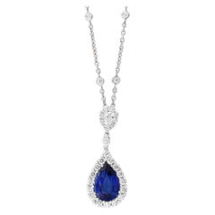 Halskette mit 5,10 Karat birnenförmigem blauen Saphir und Diamant-Halo-Anhänger