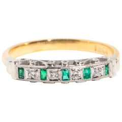 Circa 1980s Diamond and Emerald 18 Carat Yellow and White Gold Band Ring