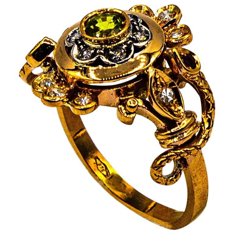 Art Nouveau Style White Diamond Peridot Ruby Yellow Gold Cocktail "Snakes" Ring For Sale