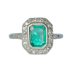 Art Deco Emerald and Diamond 18 Carat White Gold Panel Cluster Ring
