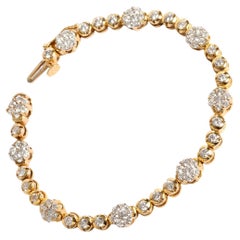 Joli bracelet marguerite en or jaune 14 carats et diamants de 3,75 carats.