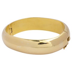 Bracelet jonc ovale à charnières en or jaune 18 carats