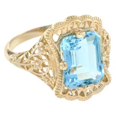 Natural Emerald Cut Blue Topaz Filigree Ring in Solid 14k Yellow Gold