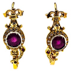 Boucles d'oreilles pendantes en or jaune, rubis, diamant blanc taillé en brillant, style Art Déco