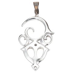 Pendentif en argent du symbole maori