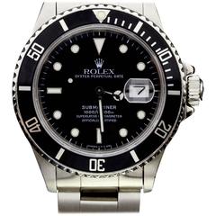 Rolex Stainless Steel Black Dial and Bezel Submariner Wristwatch 