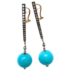 Boucles d'oreilles en jade de couleur turquoise et diamants