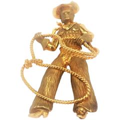 Antique Captivating B.D. Howes and Son Gold Cowboy Rodeo Man Pin Brooch