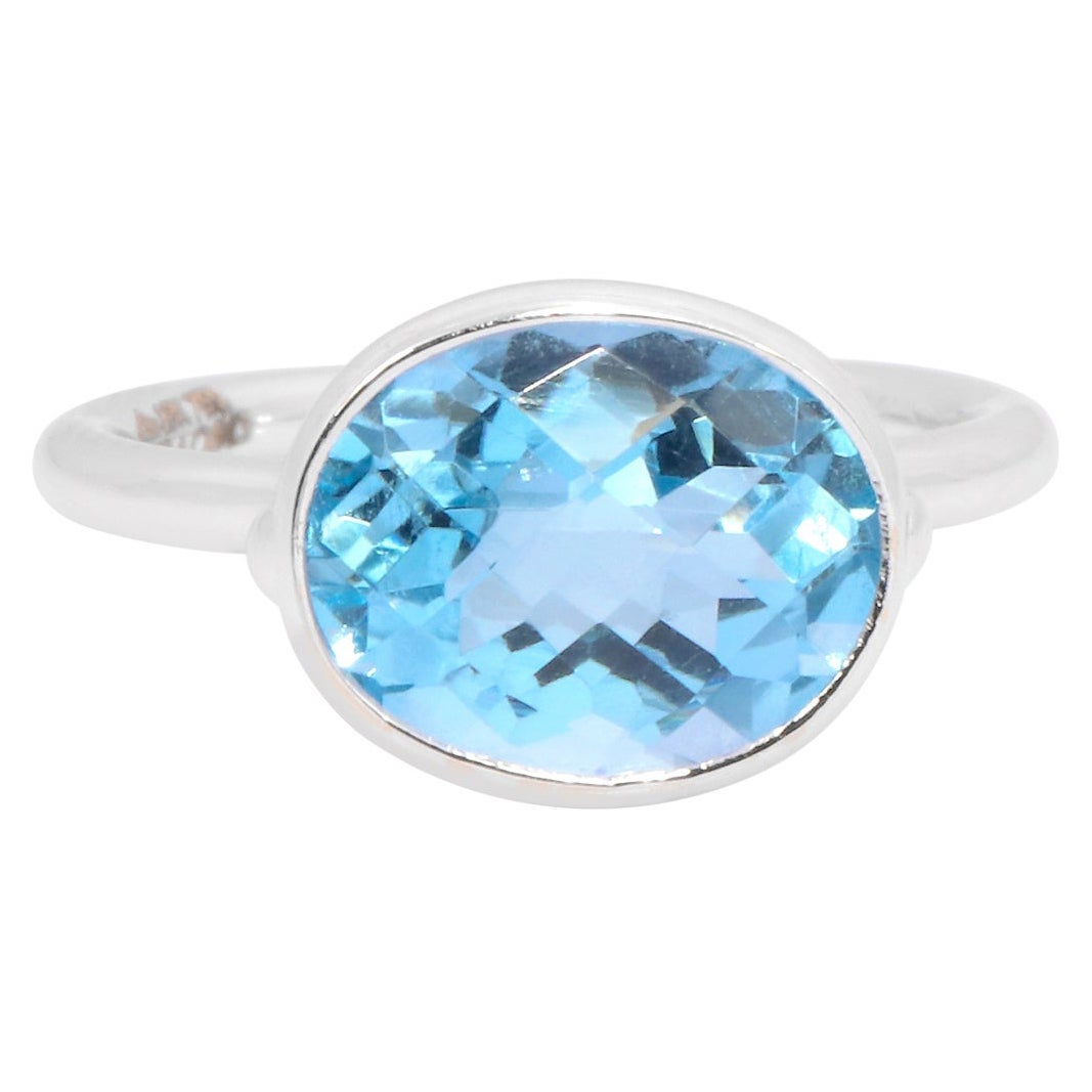 Bague cocktail solitaire en or blanc 18 carats avec topaze bleue de 5,58 carats en vente