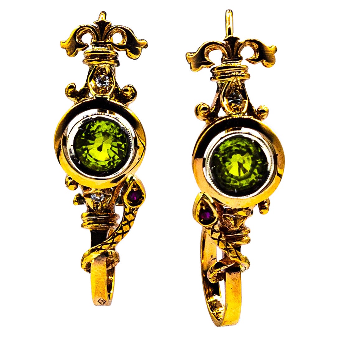 Clous d'oreilles en goutte de style Art déco en or jaune avec diamants blancs, péridots et rubis