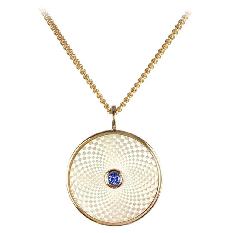 Deakin & Francis Small Pendant with White Mother of Pearl and a Blue Sapphire For Sale