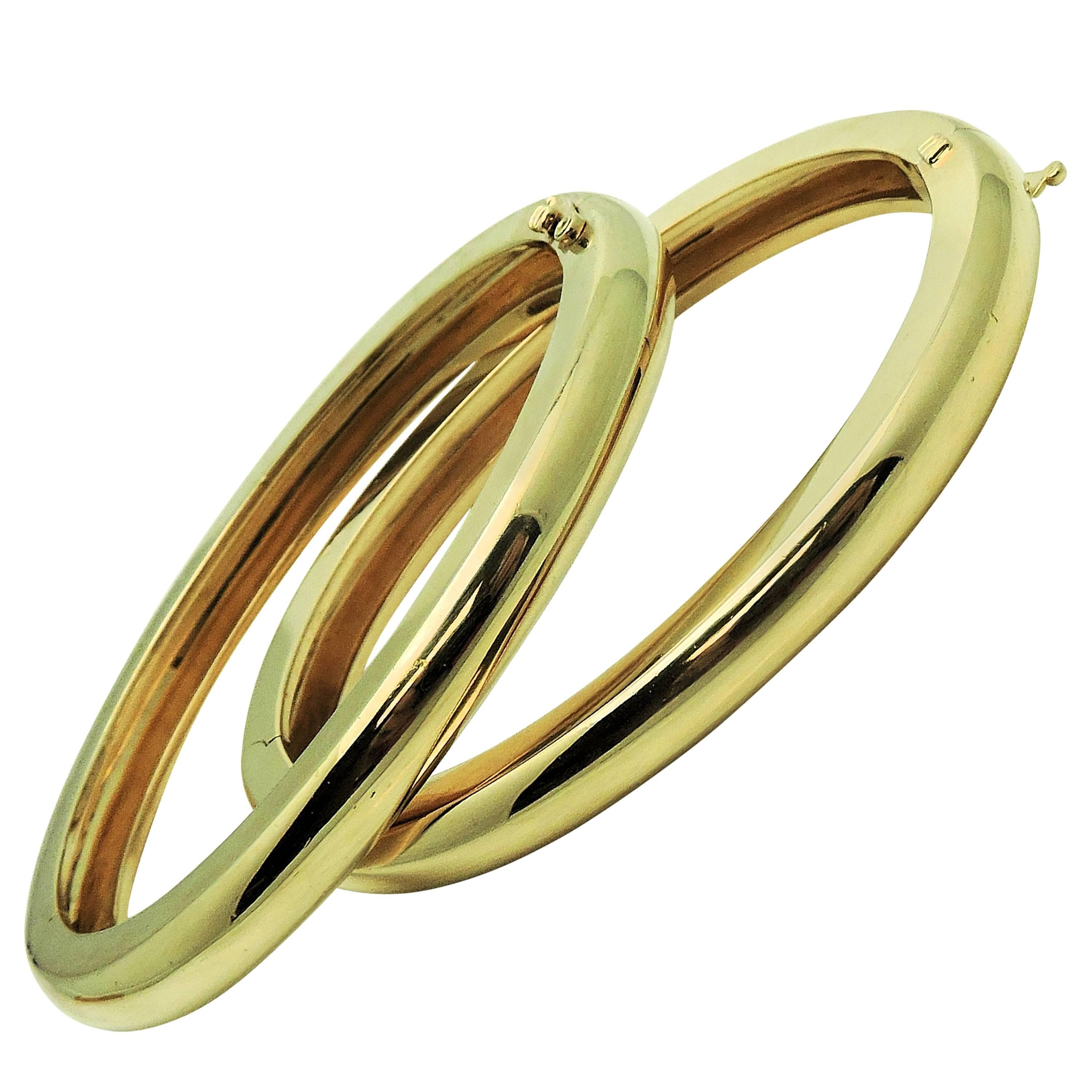 Pair of Classic Yellow Gold Hinged Bangle Bracelets For Sale