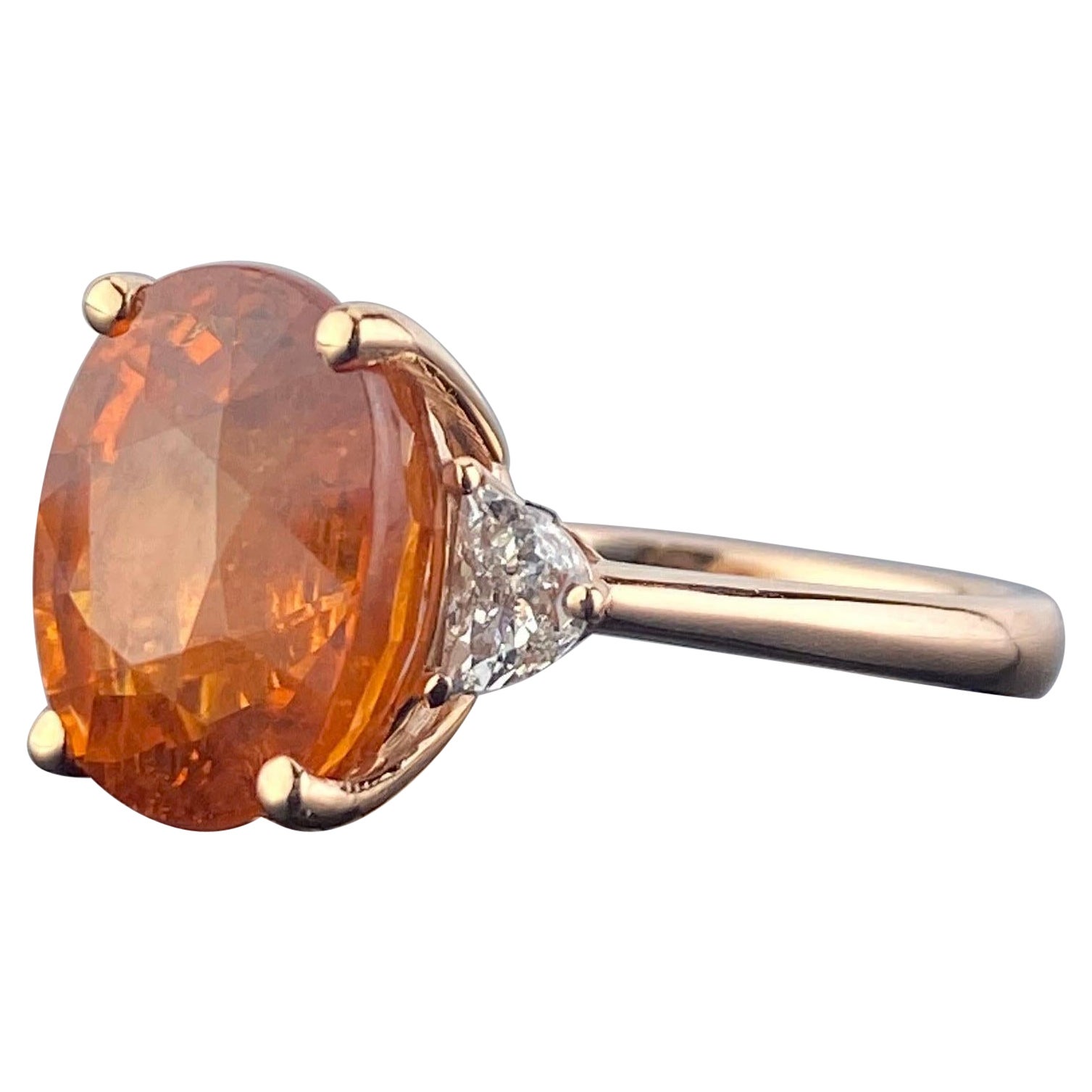 10.21 Carat Oval Mandarin Garnet and Diamond Three Stone Engagement Ring For Sale