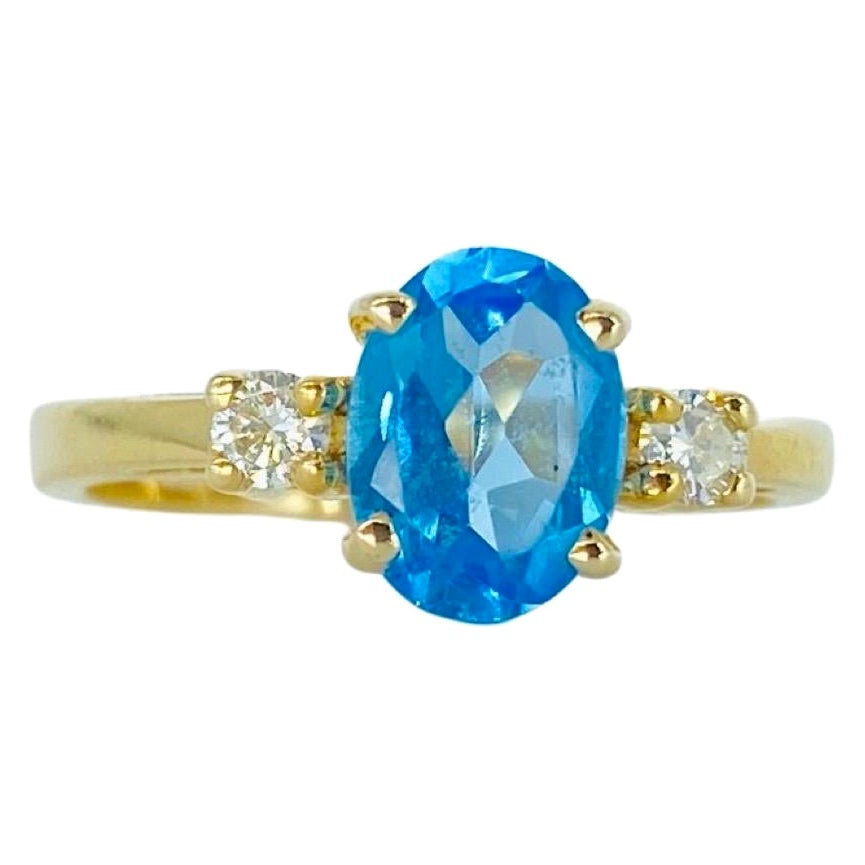 Bague vintage en or 14 carats avec aigue-marine de 1,21 carat et diamants de 0,04 carat au total