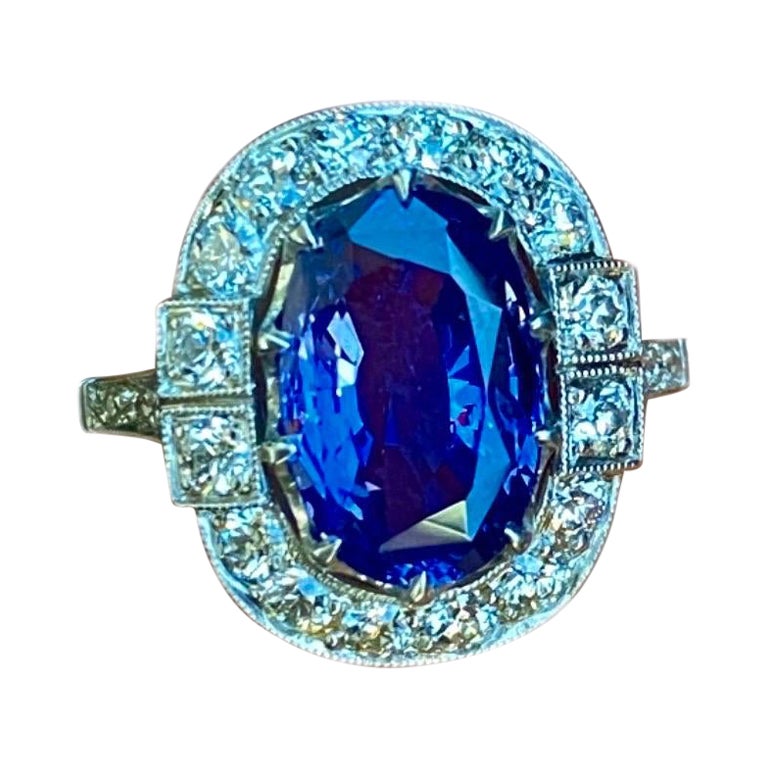 DeKara Designs Collection

Art Deco Inspired Extremely Elegant Handmade Elongated Blue Sapphire Antique Diamond Engagement Ring.

Metal- 90% Platinum, 10% Iridium.

Stones- GIA Certified No Heat Elongated Oval Blue To Purple Sapphire 3.88 Carats, 22