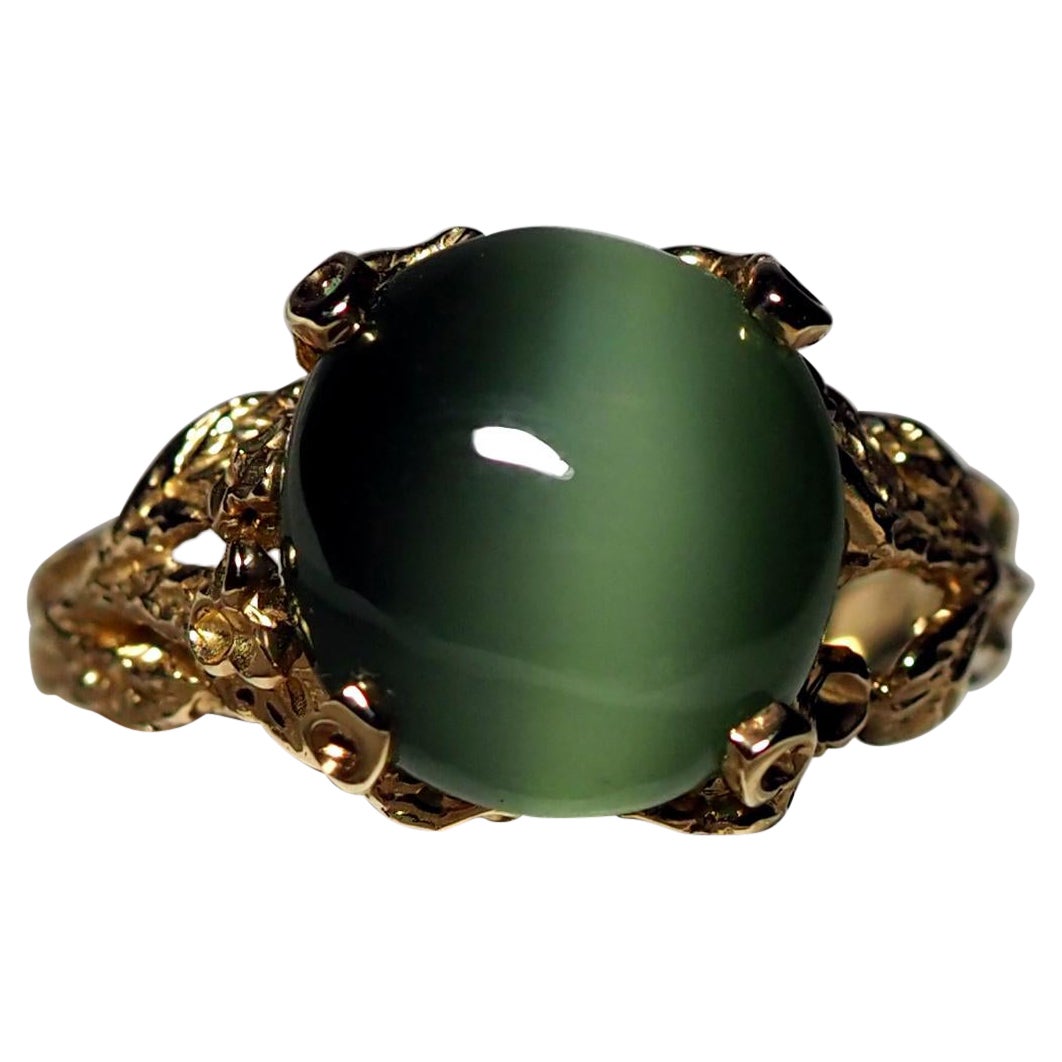 Bague de fiançailles chats oeil de chat effet chatoyant en or et jade néphrite verte