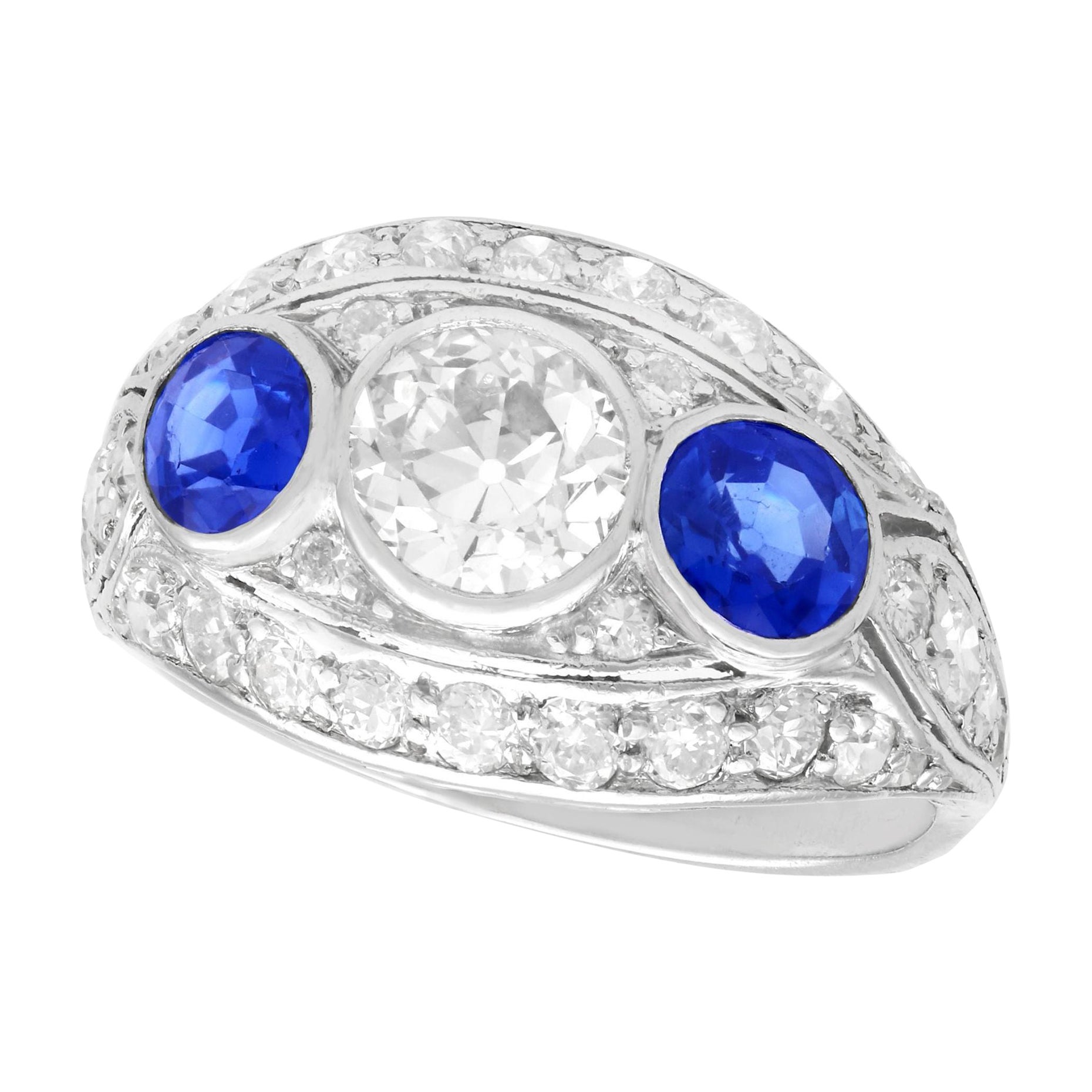 Art Deco 1.94 Carat Diamond and Sapphire Platinum Cocktail Ring For Sale