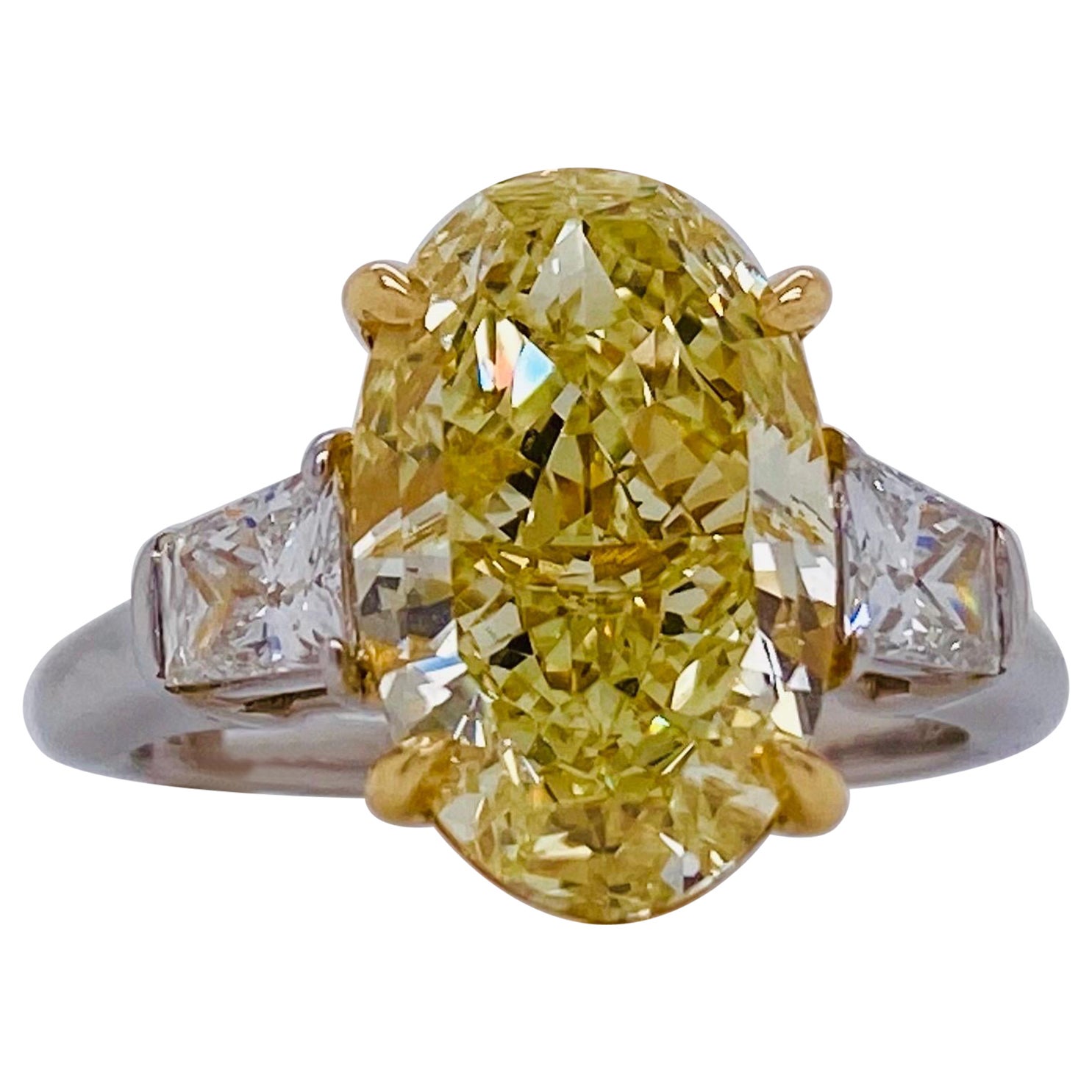 Emilio Jewelry GIA Certified 5.75 Carat Oval Fancy Yellow Diamond Ring For Sale