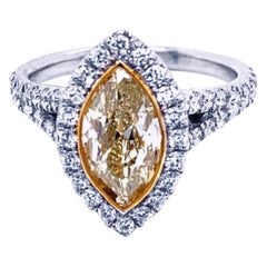 1.5 Carat Yellow MQ Diamond in Pave Set 18 Karat Split Shank Ring with Halo