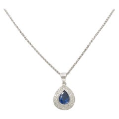 Blue Sapphire & Diamond Halo Pendant Necklace in 18k