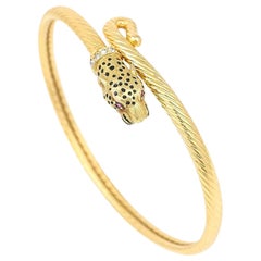 Contemporary 18ct Gold Diamond, Ruby and Enamel Leopard Head Bangle