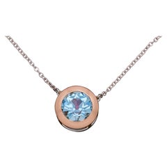 Collier à pendentif solitaire en aigue-marine et rubis, or rose 18 carats et platine