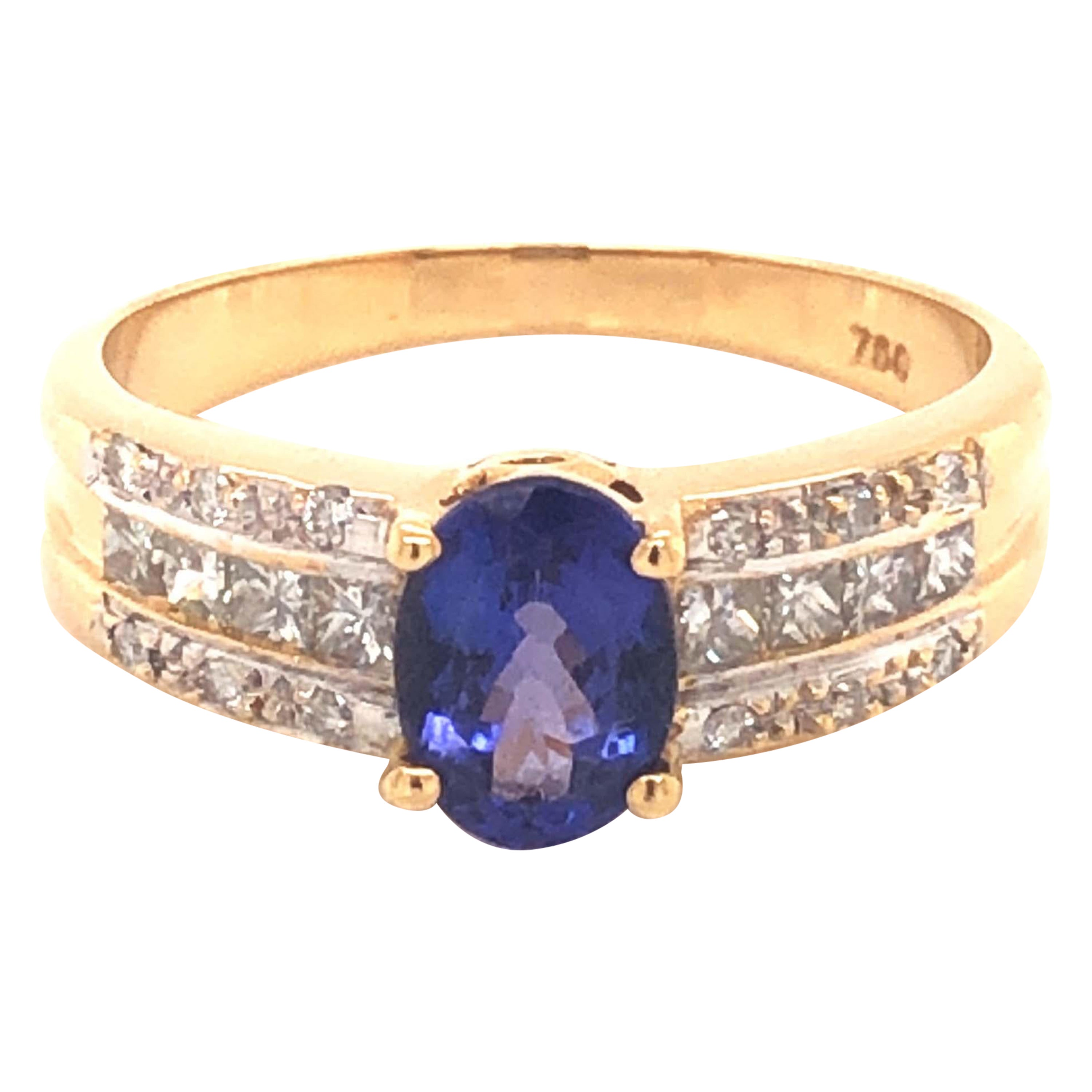 Blauer, lila Tansanit und Diamantring aus 18 Karat Gelbgold