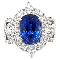 Danuta Oval Blue Sapphire 7.5 Carat and Diamond Platinum Engagement Ring