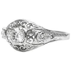 Antique 1930s Round and Pear Shaped Diamond Platinum Engagement Ring
