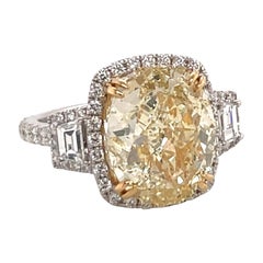 GIA Certified Oval Cut Fancy Light Yellow Diamond Engagement Ring 7.16 Carats VS