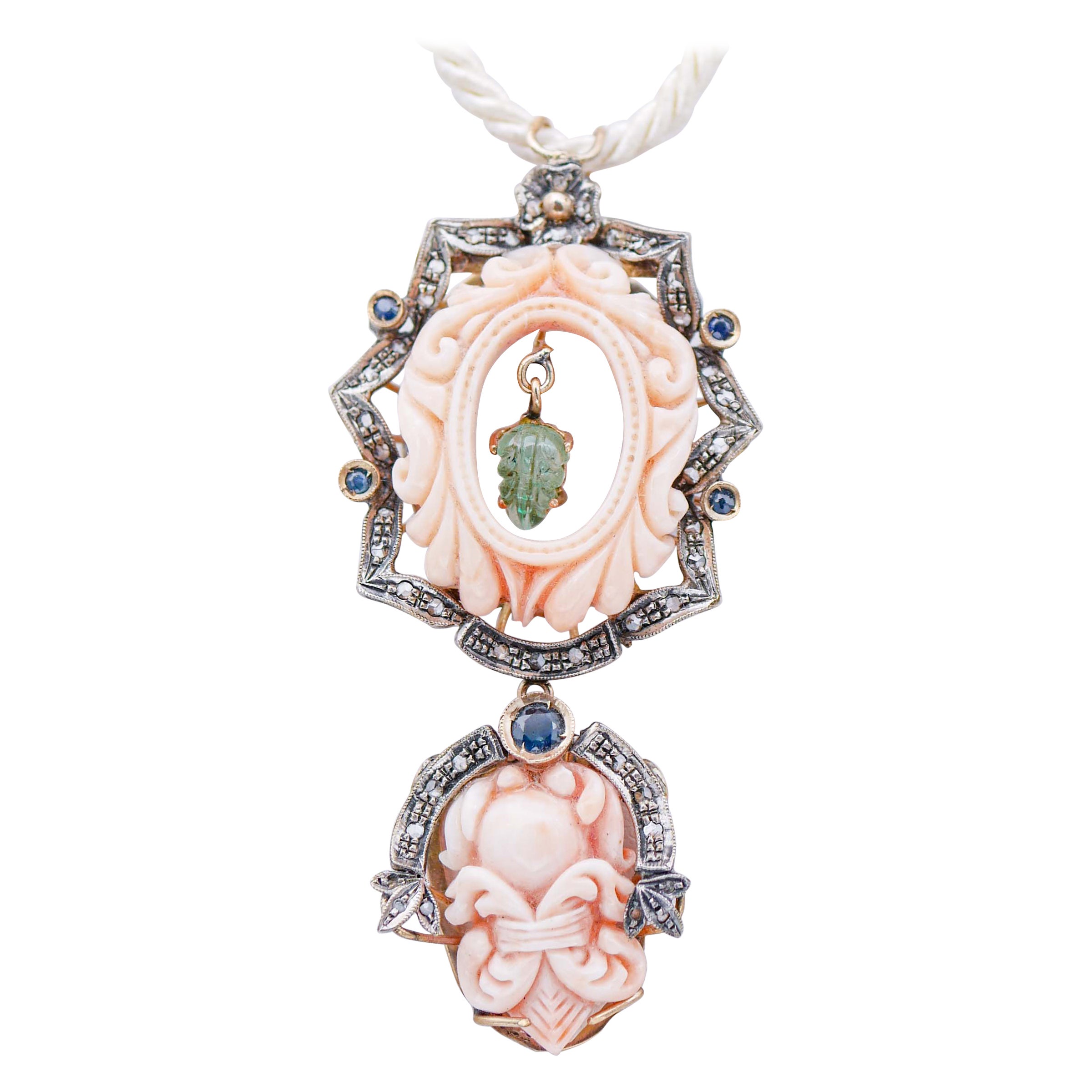 Collier pendentif en or et argent 14 carats, corail rose, émeraudes, saphirs, diamants