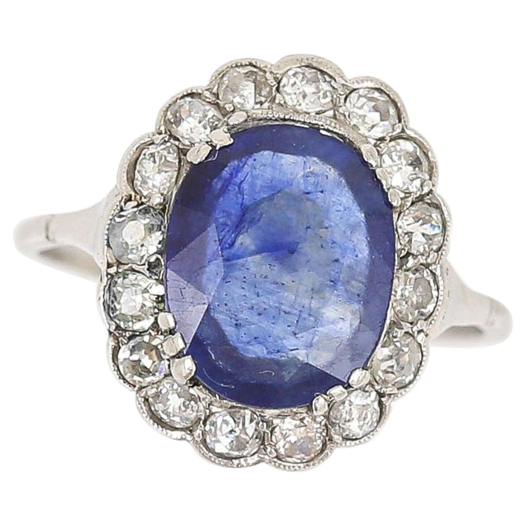 Art Deco Platinum 2.8ct Oval Sapphire 1.5ct Old Mine Cut Diamond Ring circa 1920