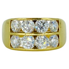 Bague vintage en or 18 carats avec diamants de 2,49 carats de poids total et sertissage en canal