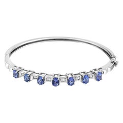 14K White Gold Oval Blue Tanzanite and 1/4 Cttw Diamond Bangle