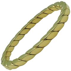 18K Yellow Gold ItalianTwist Motif Hinged Bangle Bracelet.