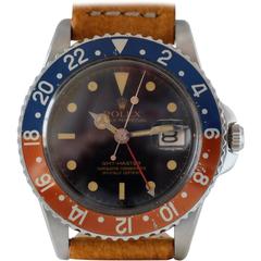 Retro  Early Rolex GMT with glossy black and gilt dial