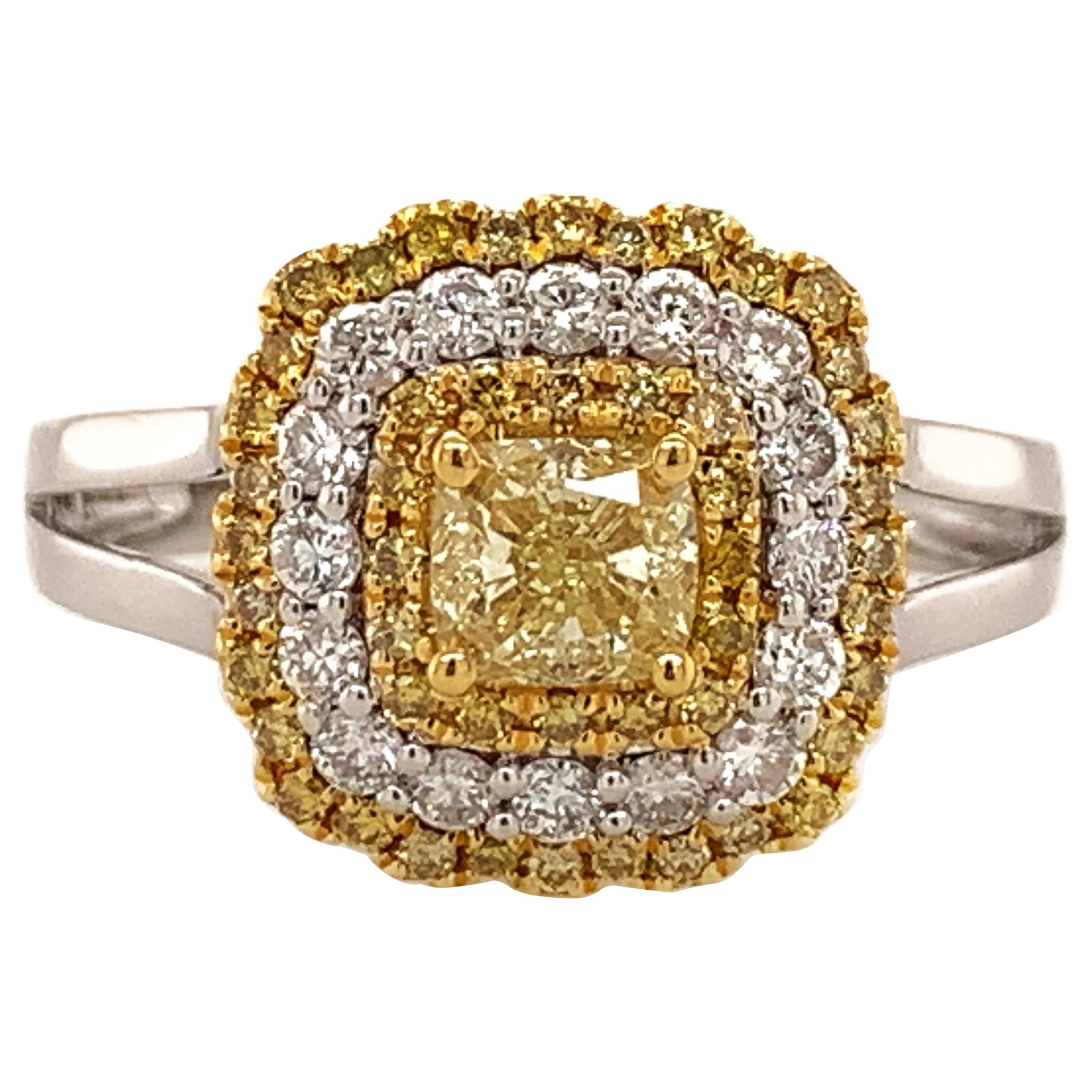 0.61 Carat Fancy Yellow Diamond Bridal Ring For Sale