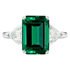 IGI Certified 7.90 Carat Zambian Emerald Trillion Diamond Ring