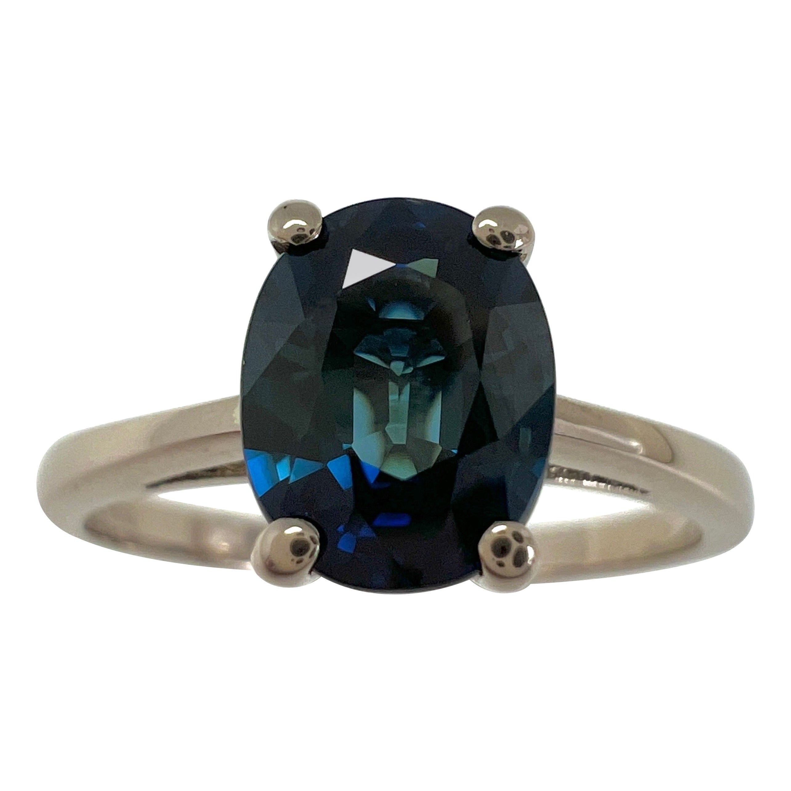 Deep Teal Blue 1.60 Carat Sapphire Oval Cut 18 Karat White Gold Solitaire Ring For Sale